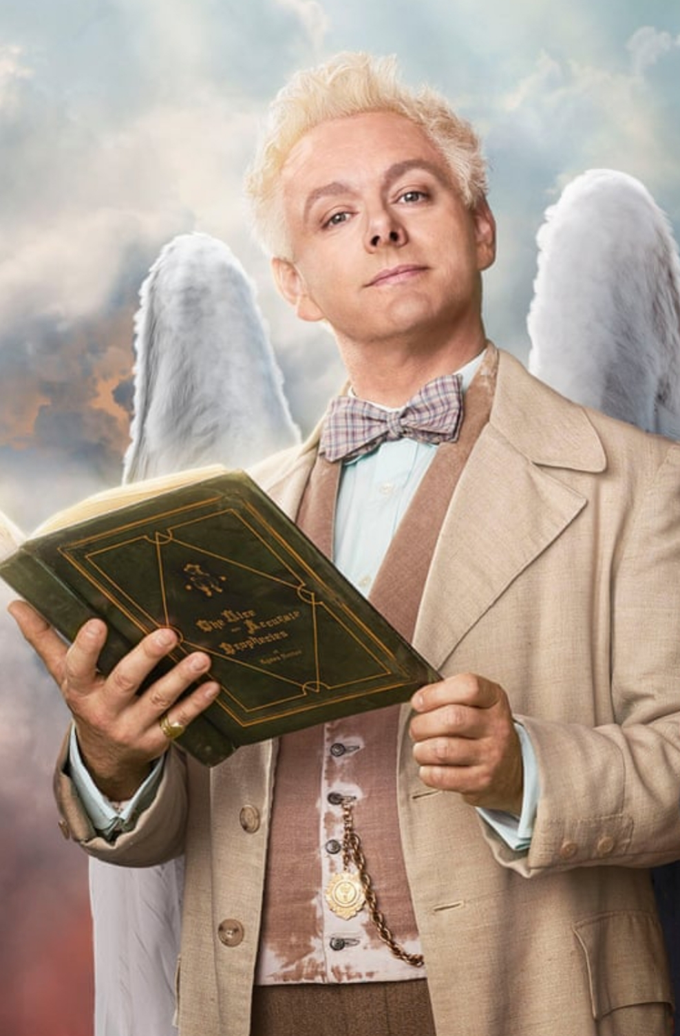 Image of Aziraphale holding Agnes Nutter's book of prophecies.