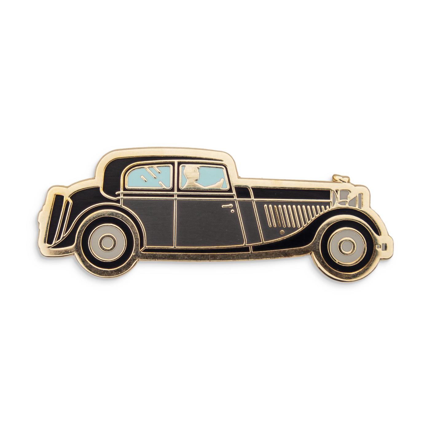 Photograph of a Good Omens enamel pin: The Bentley