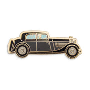 Photograph of a Good Omens enamel pin: The Bentley