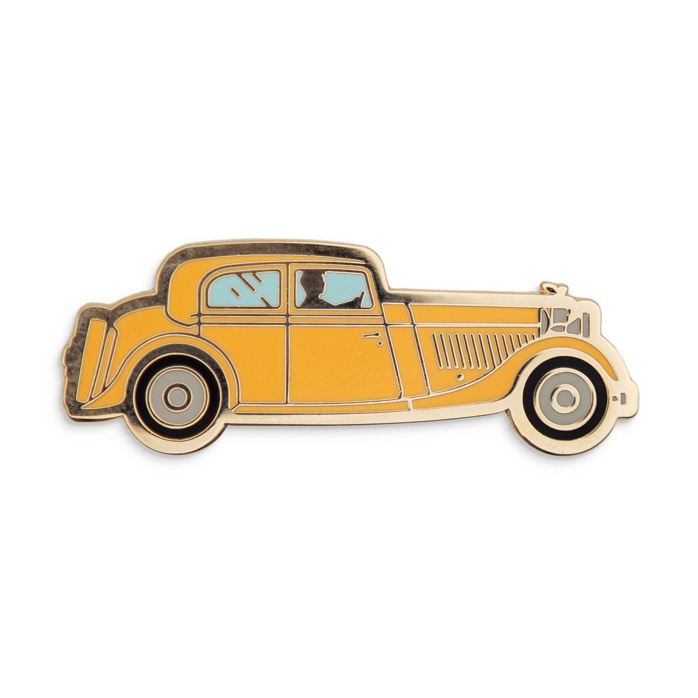 Photograph of a Good Omens enamel pin: Yellow Bentley