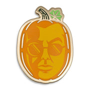 Enamel pin featuring Crowley as a pumpkin.