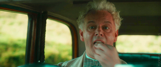 Aziraphale eating a travel sweet as seen in Good Omens Season 2.