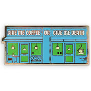 Photograph of a Good Omens enamel pin: Give Me Coffee of Give Me Death