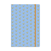 A blue notebook featuring ducks illustrated by Colleen Doran.