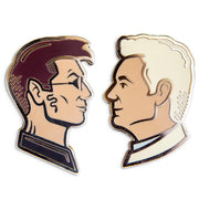 Photograph of a Good Omens enamel pin set: Crowley and Aziraphale.